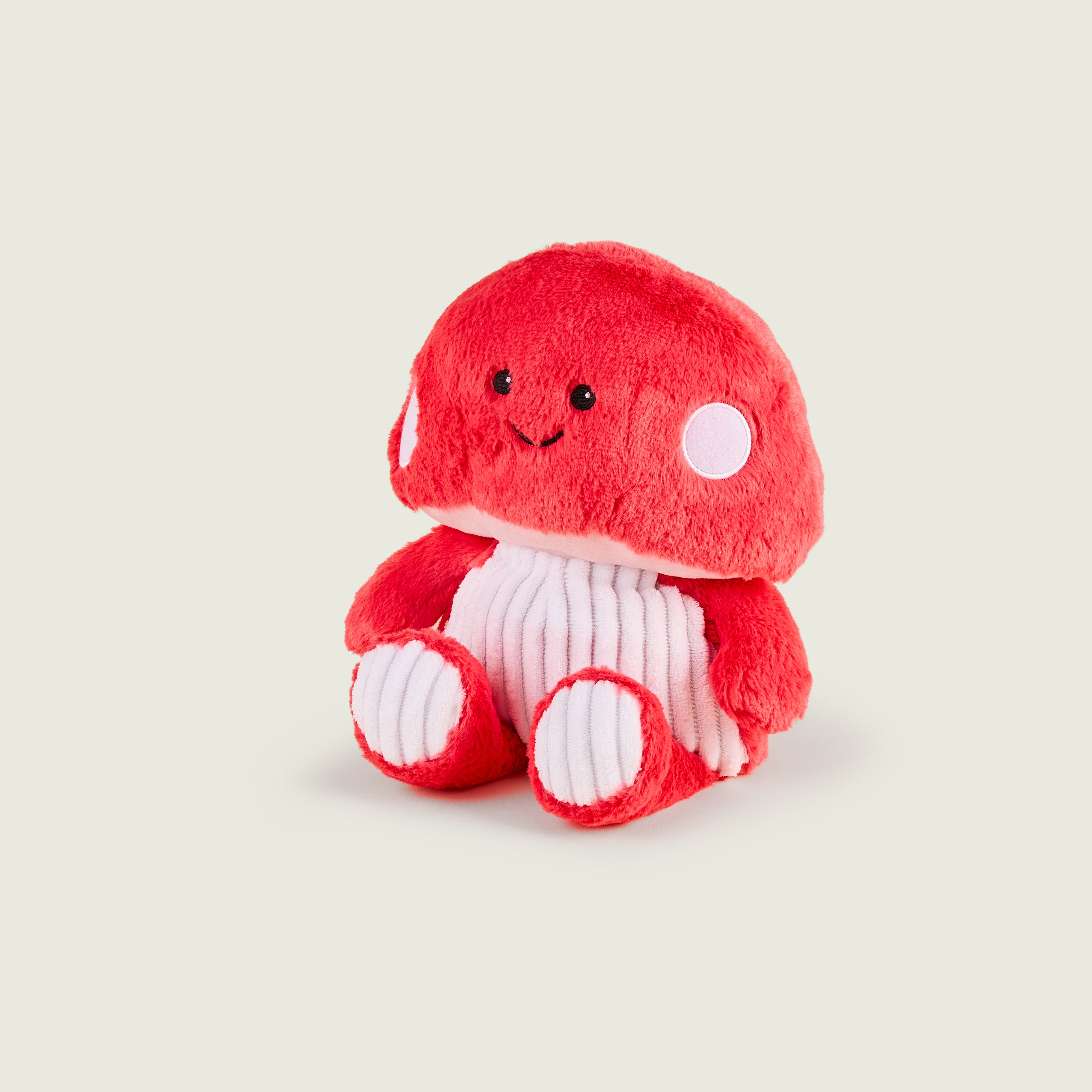Bouillotte peluche en forme de champignon rose de face
