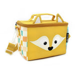 Petit sac isotherme jaune de la marque Déglingos, modèle Cyranos le renard, avec visage de renard brodé sur le devant, oreilles en relief sur le dessus, côtés à carreaux colorés (orange, bleu, vert, crème), poignée supérieure, bandoulière ajustable et fermeture zippée. Compact, ludique et pratique pour transporter repas ou médicaments.