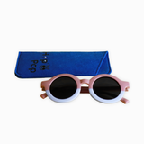 lunettes de soleil rose et blanche pour enfant protection catégorie 3 avec sa pochette de rangement en suédine bleu marine 