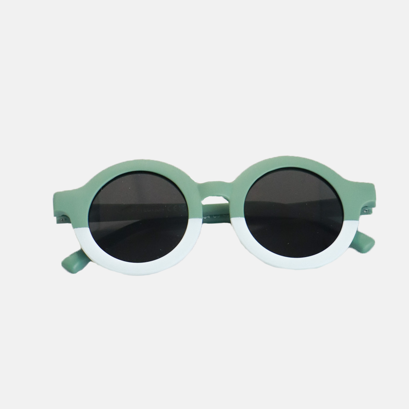 Lunettes de soleil bébé catégorie 3 Hop'Pop bicolores vert et blanc, verres ronds noirs haute protection anti-UV, idéales pour forte luminosité.