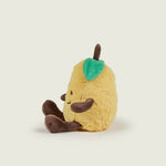 Bouillotte peluche en forme de citron jaune avec jambes et bras marron et visage souriant positionné de profils