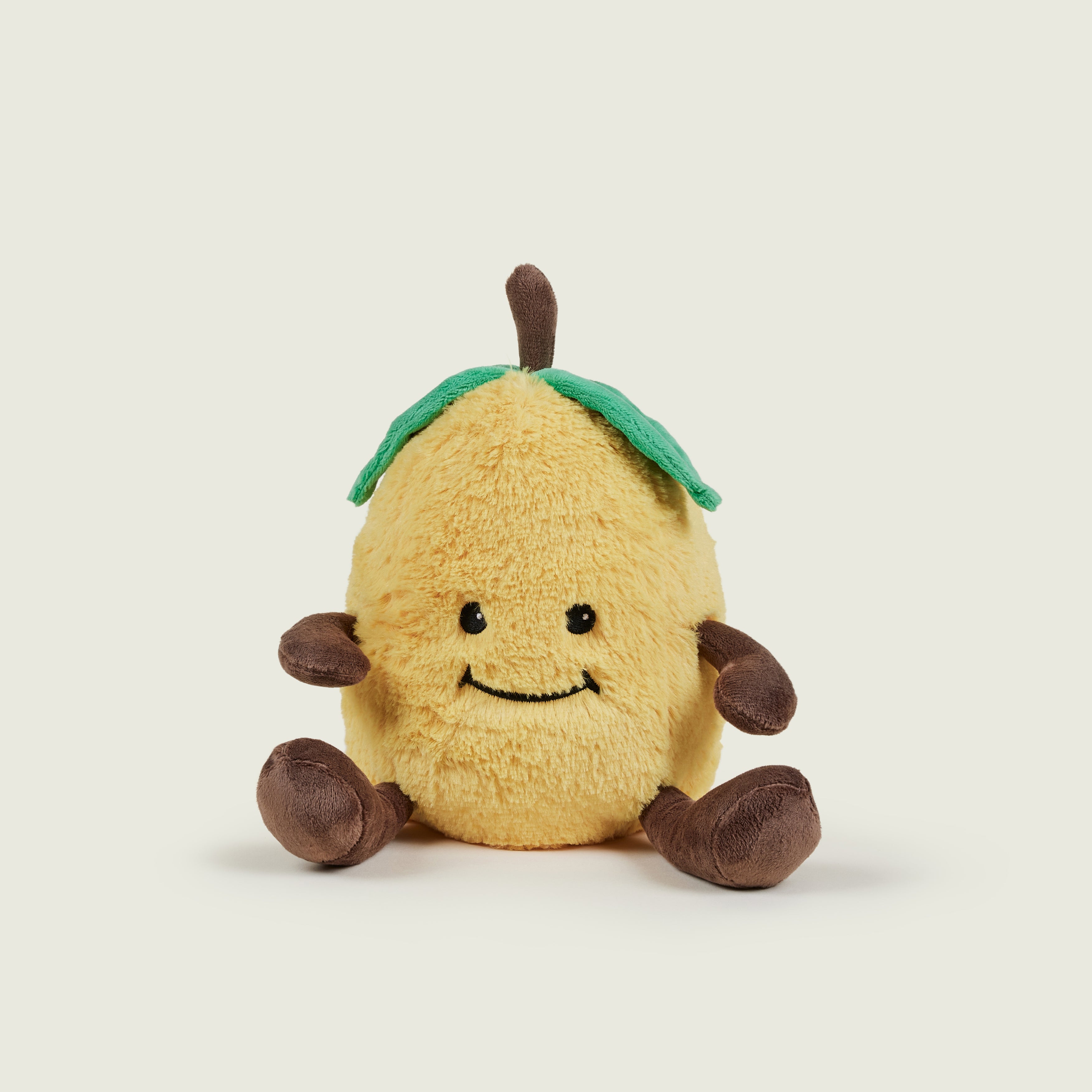 Bouillotte peluche en forme de citron jaune avec jambes et bras marron et visage souriant 