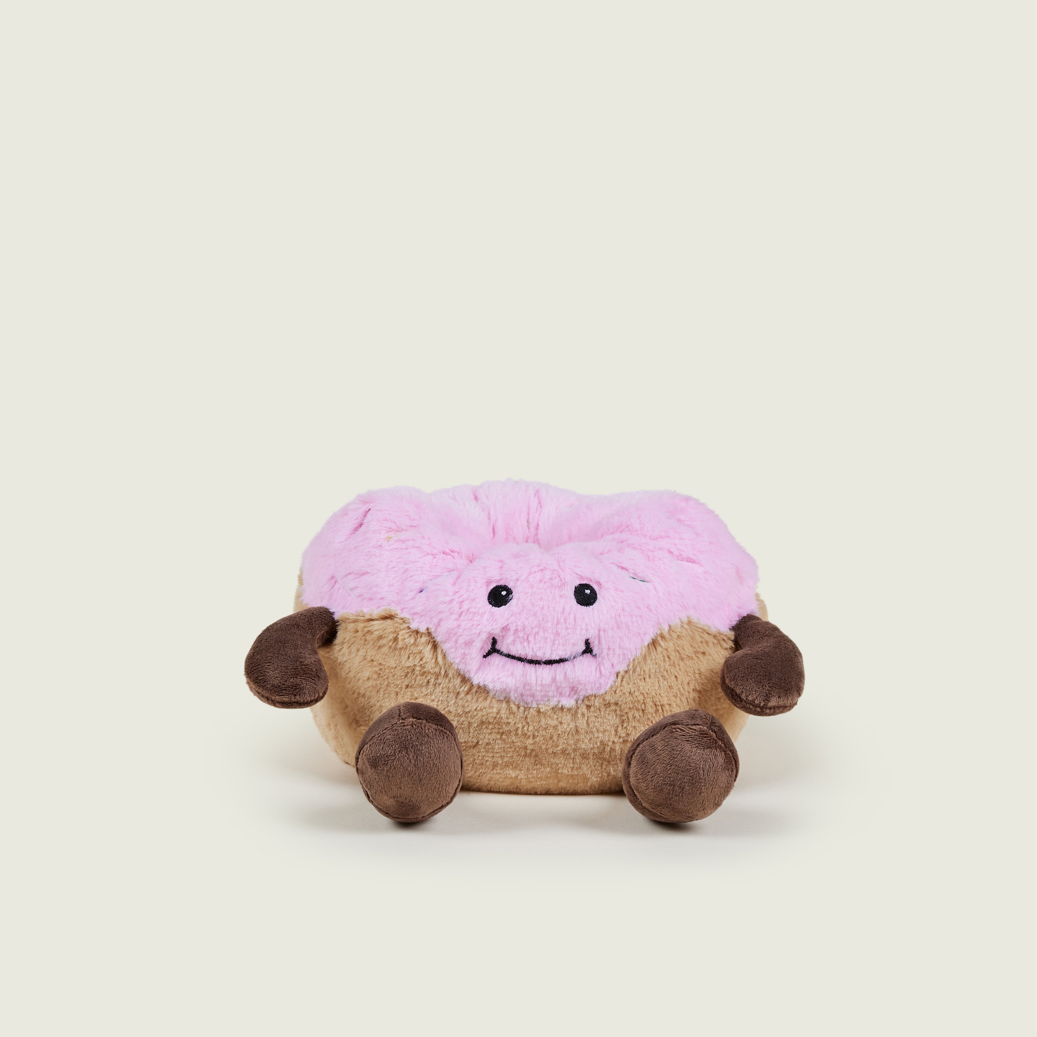 bouillotte peluche en forme de donut's rose et marron avec visage, jambes et bras 