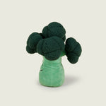 Bouillotte peluche en forme de brocoli positionné sur le profil gauche