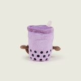 bouillotte bubble tea violet avec bras et jambes marron de dos