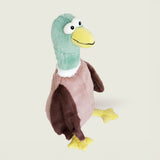 Bouillotte peluche en forme de canard de la marque Warmies, vu de profil, avec une tête verte, un bec jaune et un corps marron 