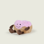 bouillotte peluche en forme de donut's rose et marron avec visage, jambes et bras 