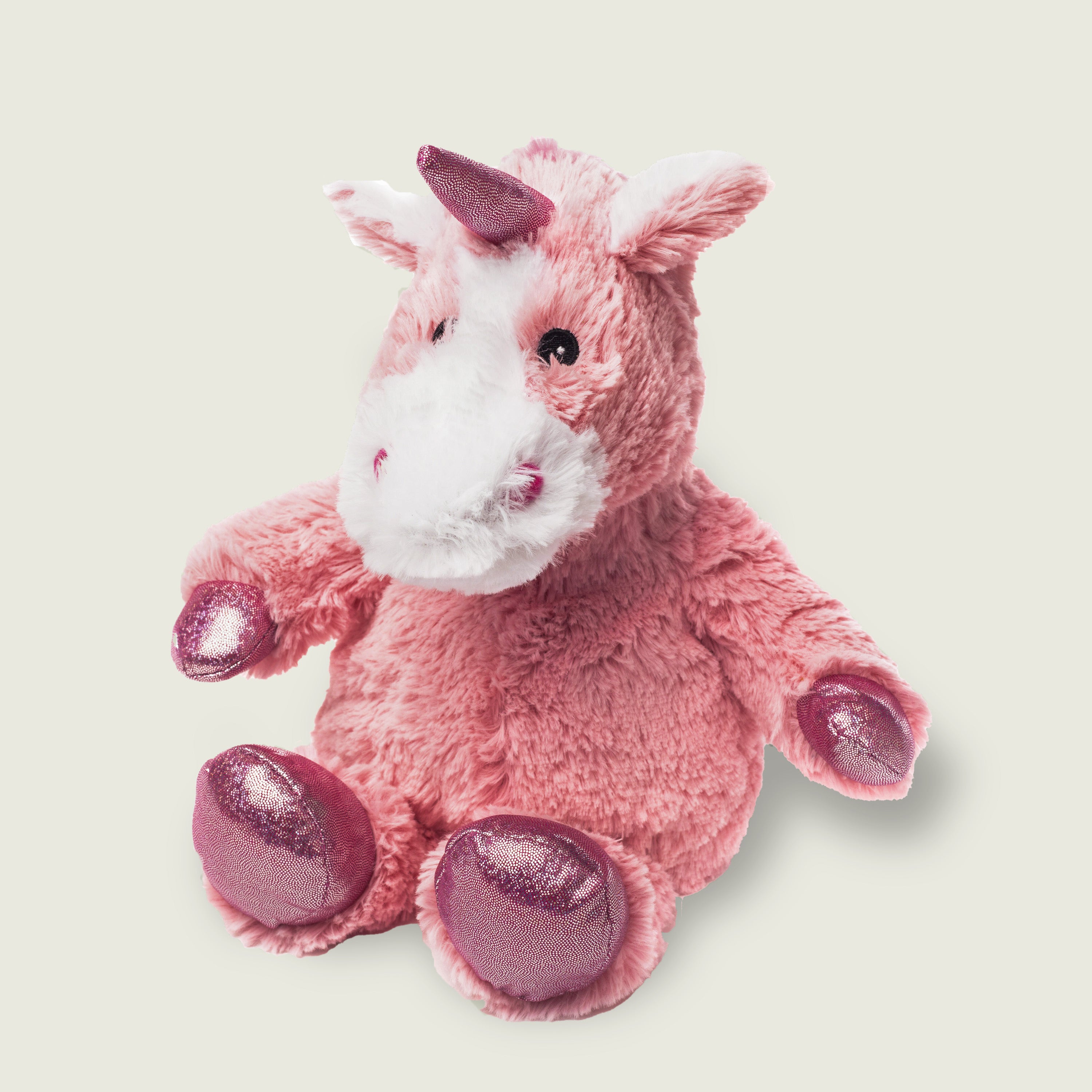 bouillotte peluche licorne Rose avec bout des pattes paillette et museau blanc 