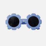 Paire de lunettes de soleil bébé catégorie 4, monture en TPEE bleue en forme de fleur. 