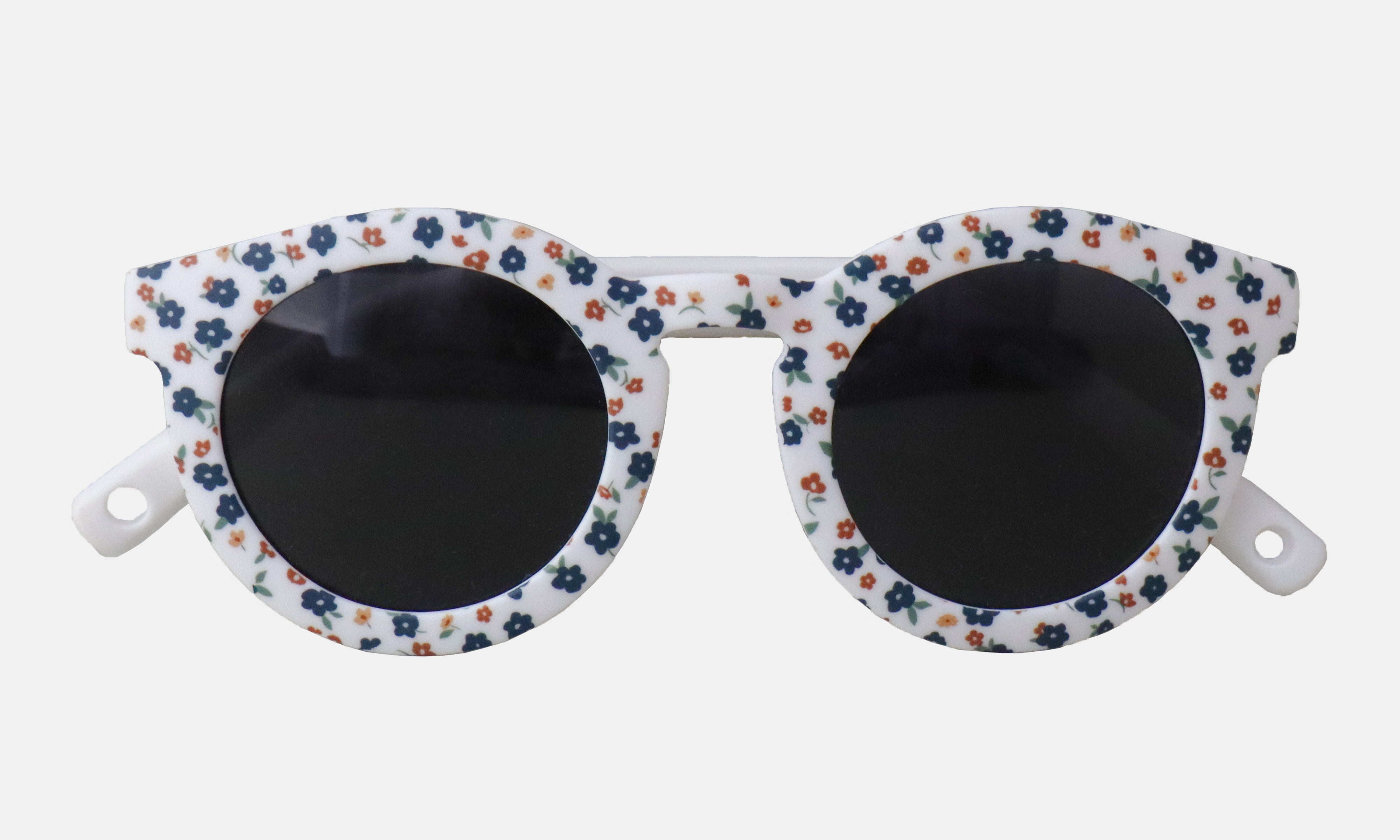 Paire de lunettes de soleil bébé catégorie 4, monture en TPEE blanc avec motif liberty fleuri. 
