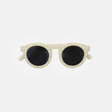 Lunettes de soleil pour adulte avec monture ronde à motif tartan, branches souples créme, et verres noirs polarisés – modèle Hop'Pop CAT3, conçu pour une haute protection anti-UV.