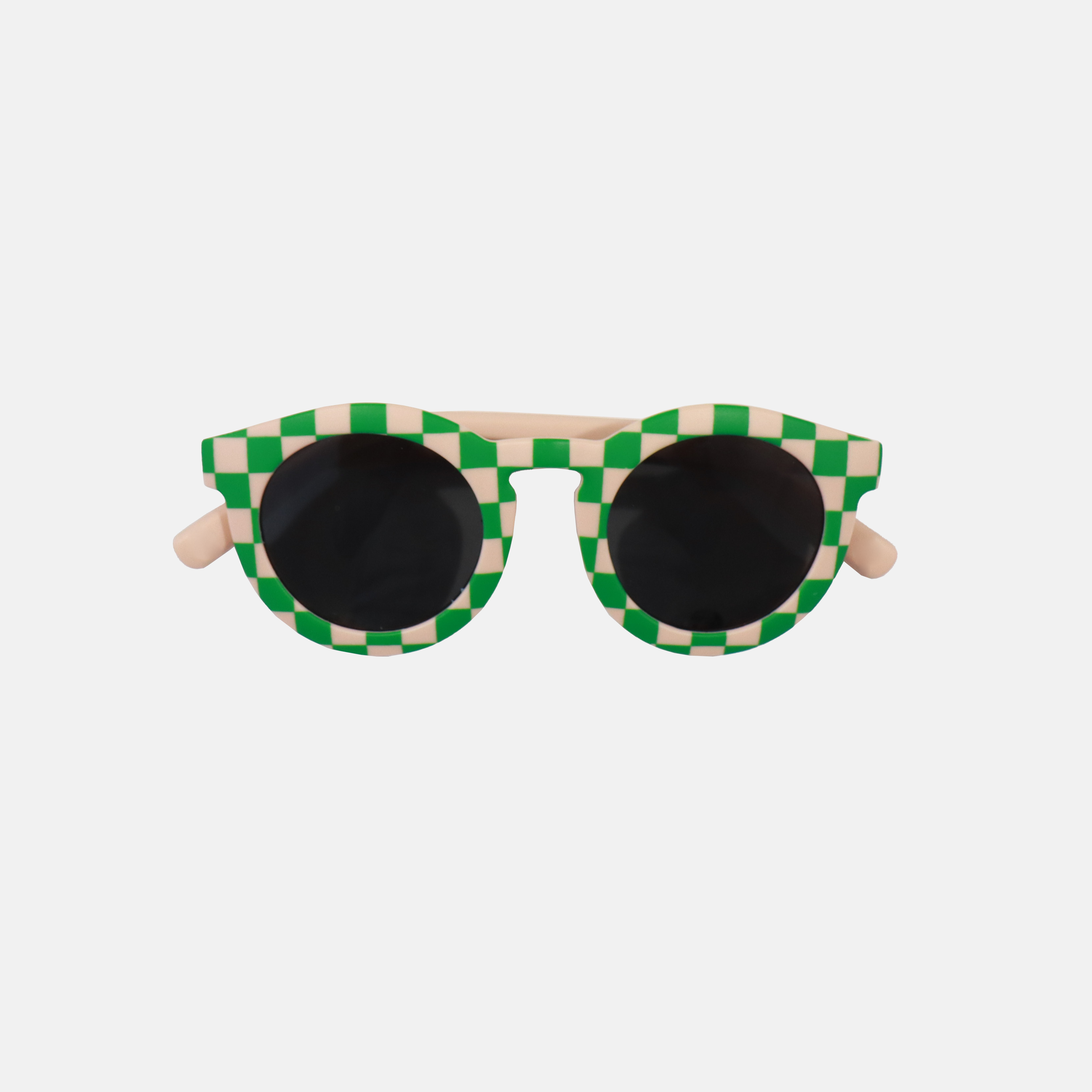 Lunettes de soleil pour enfants avec monture ronde à motif vichy vert, branches souples rose, et verres noirs polarisés – modèle Hop'Pop CAT3, conçu pour une haute protection anti-UV.