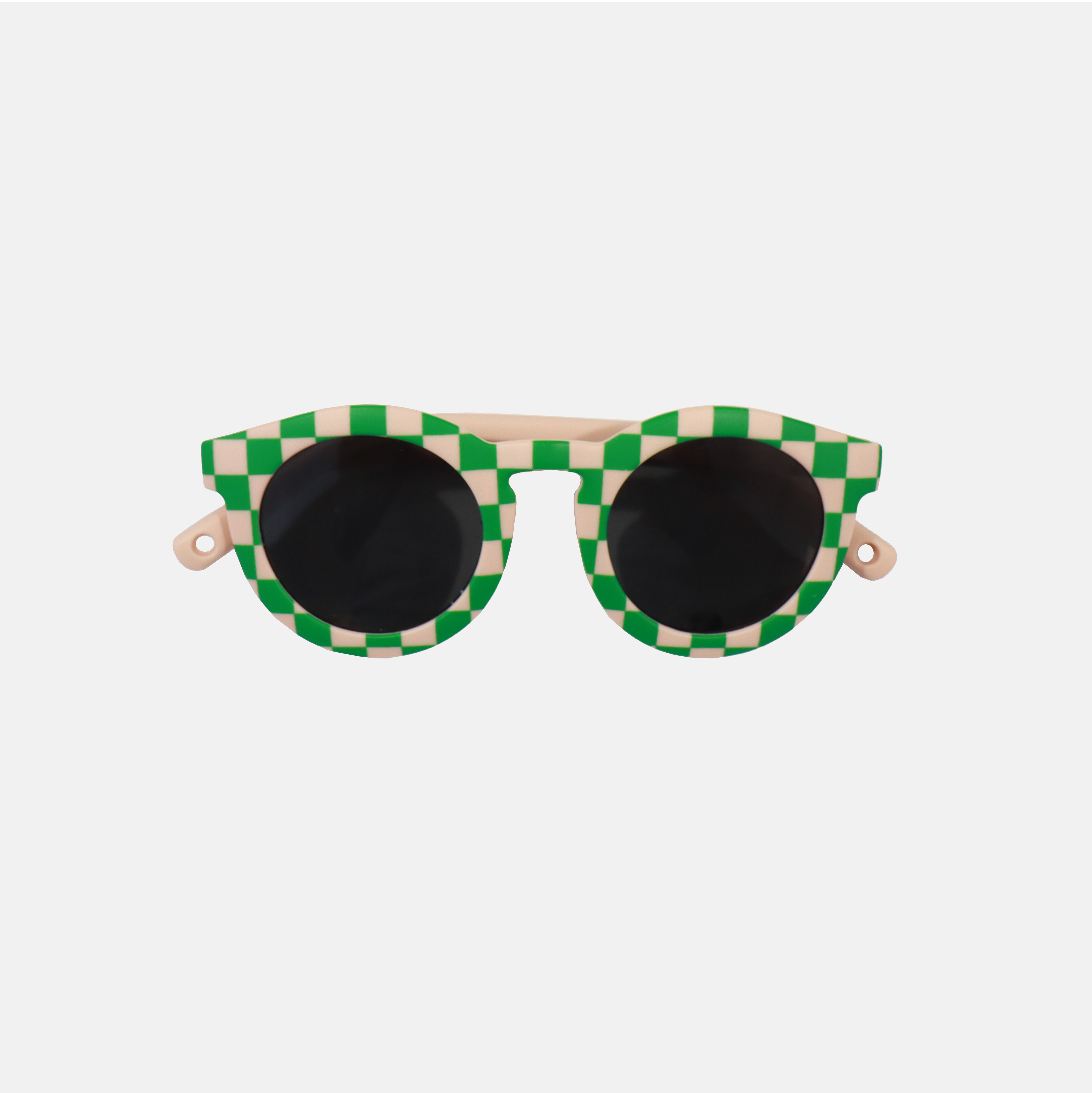 Lunettes de soleil pour enfants avec monture ronde à motif vichy vert et rose, branches souples rose, et verres noirs polarisés – modèle Hop'Pop CAT4, conçu pour une haute protection anti-UV.