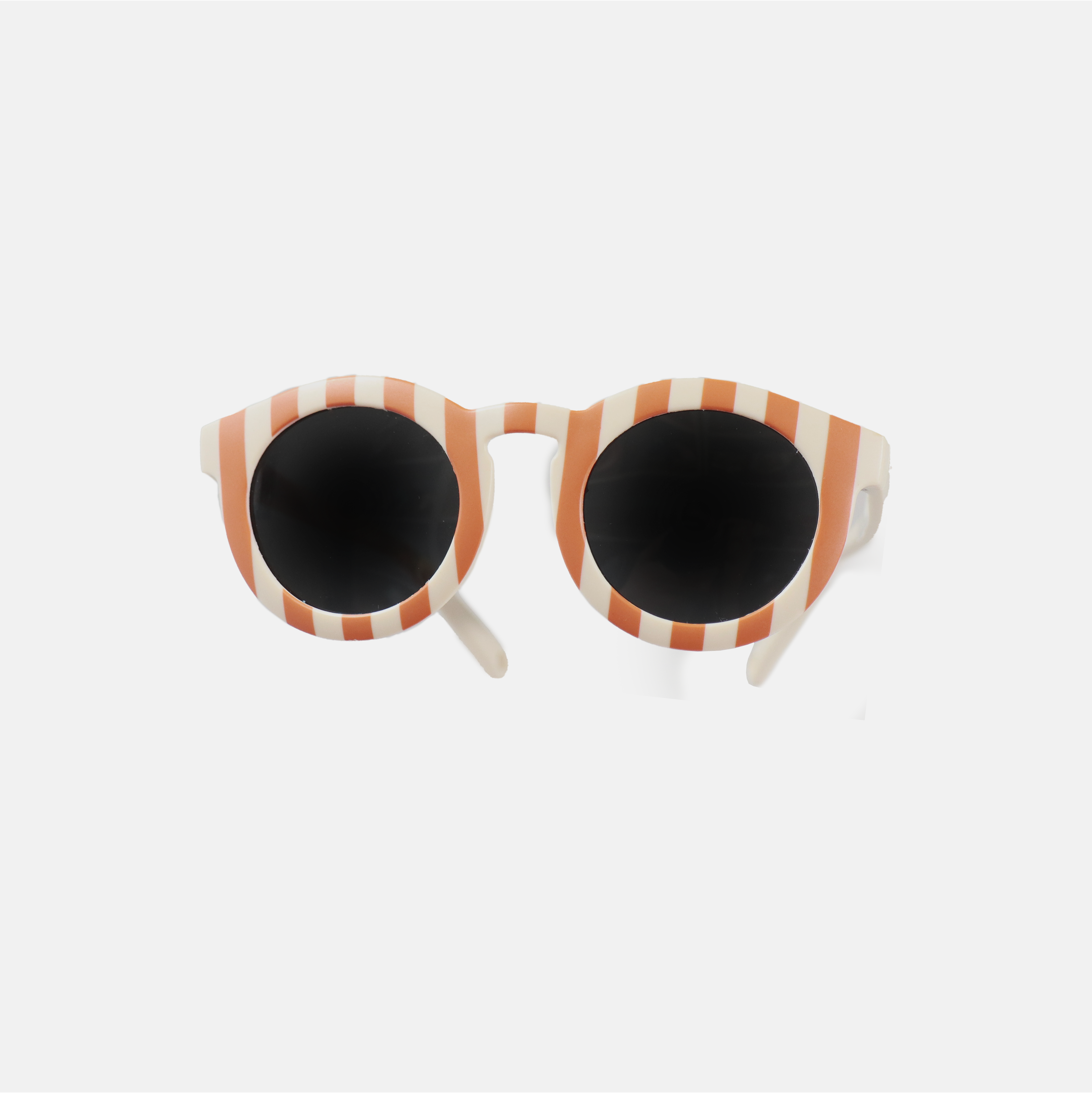 Lunettes de soleil pour enfants avec monture ronde à motif rayée rouge, branches souples crème, et verres noirs polarisés – modèle Hop'Pop CAT3, conçu pour une haute protection anti-UV.