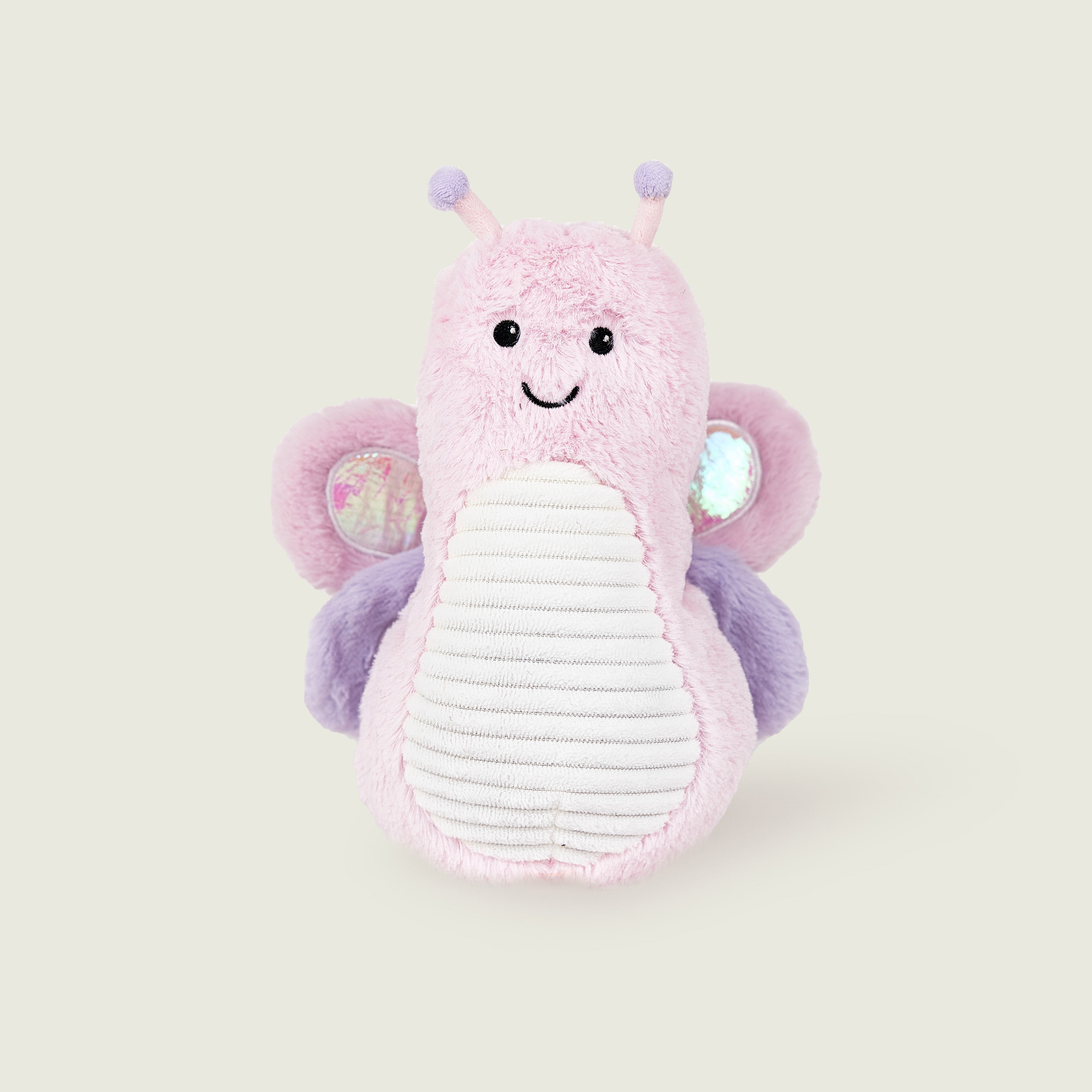 Peluche bouillotte juniors papillon, rose et violet pastel, avec ailes scintillantes, antennes et visage souriant 