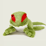 Peluche bouillotte déhoussable gecko verte, corps inférieur blanc, avec visage souriant et aplats rouge au niveau des yeux. Vue de face