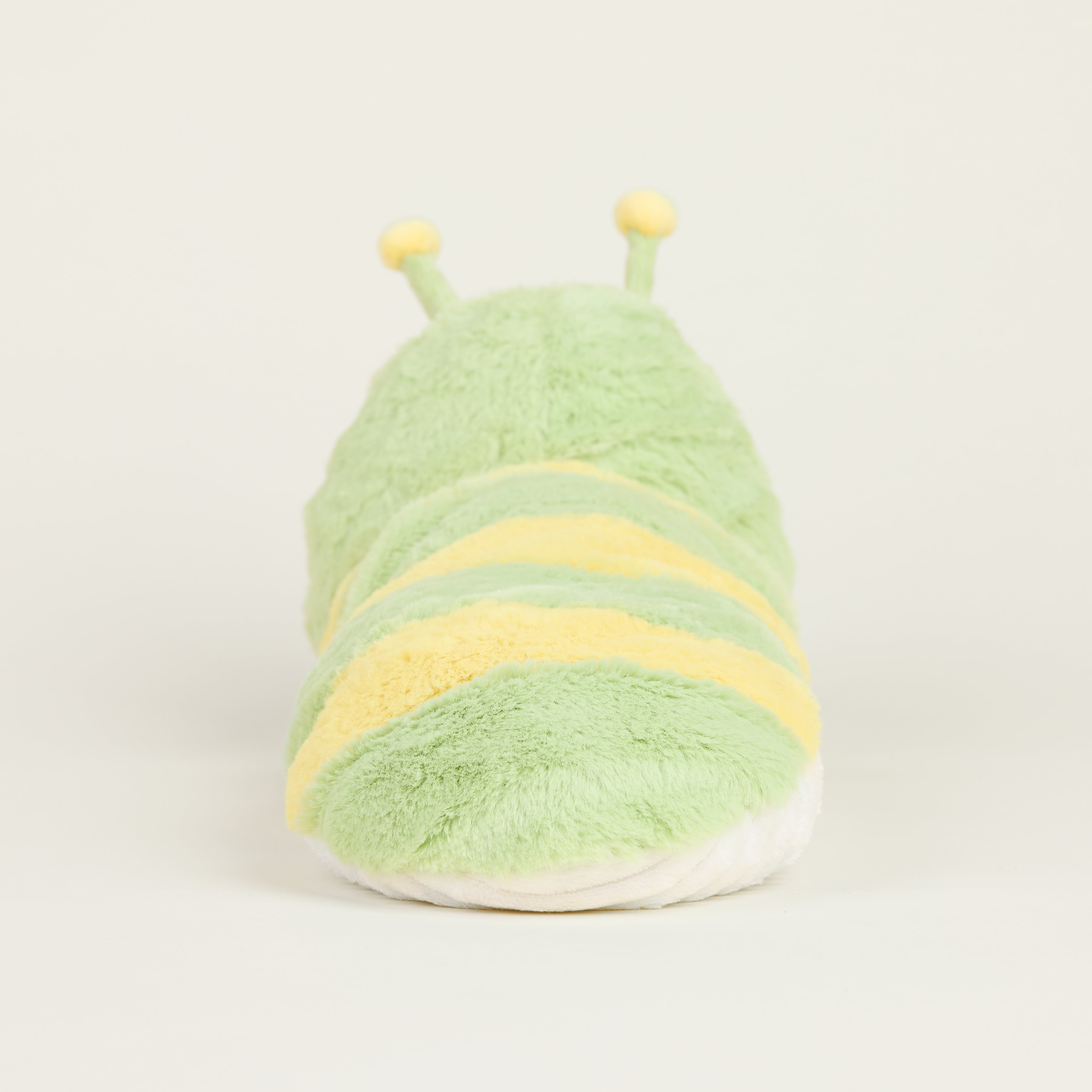 Peluche bouillotte juniors chenille, vert clair et rayée jaune avec antennes, vue de dos